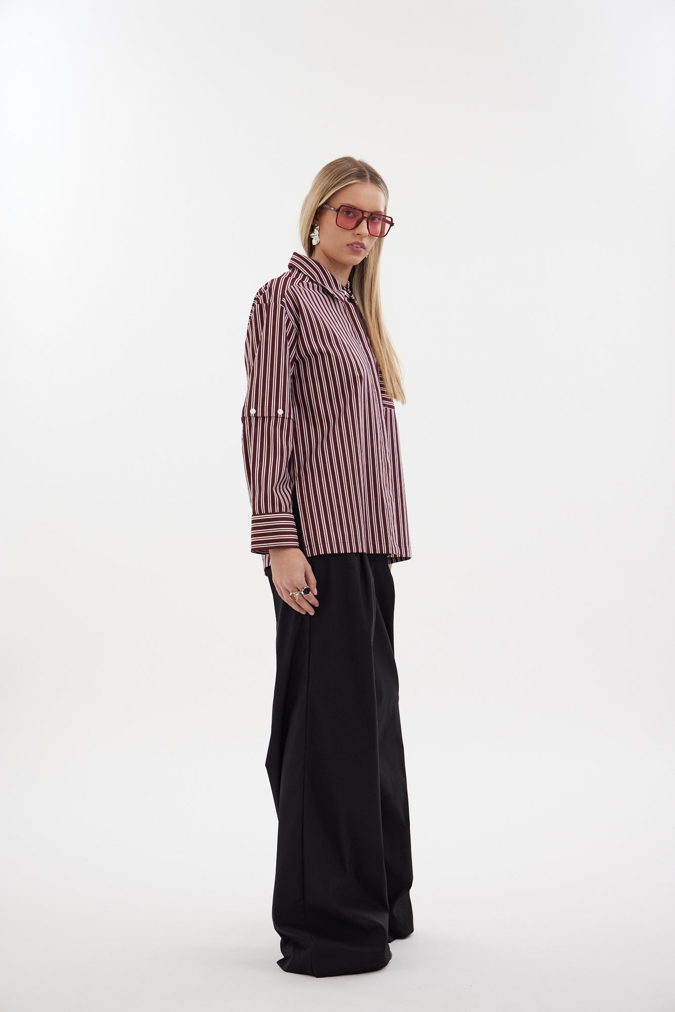 The Rebel Shirt by Racket - a two-in-one shirt with button off sleeves, boxy fit and refined detailing. Available in RKT stripe, white or black. NZ made.