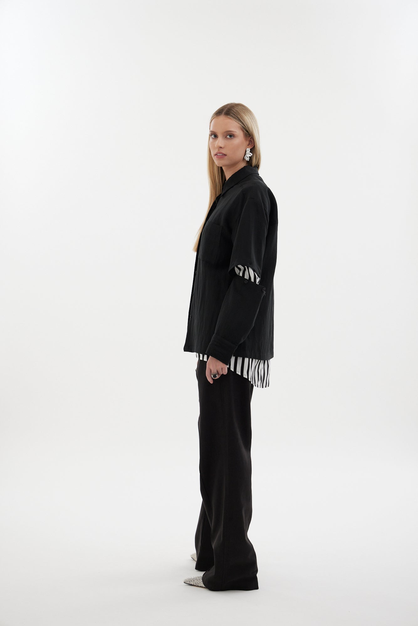 The Rebel Shirt by Racket - a two-in-one shirt with button off sleeves, boxy fit and refined detailing. Available in RKT stripe, white or black. NZ made.