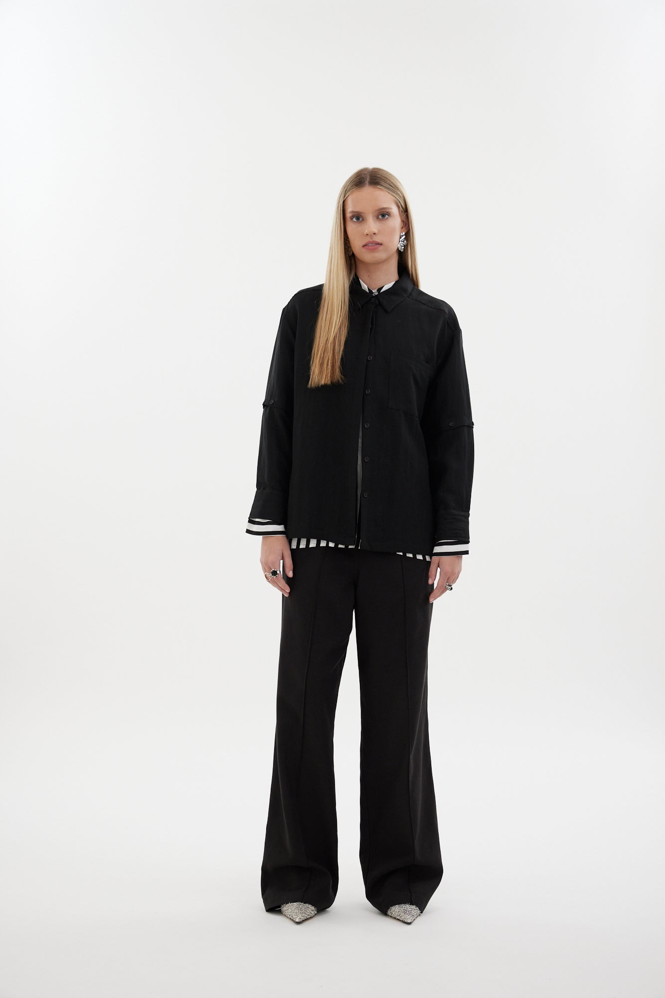 The Rebel Shirt by Racket - a two-in-one shirt with button off sleeves, boxy fit and refined detailing. Available in RKT stripe, white or black. NZ made.