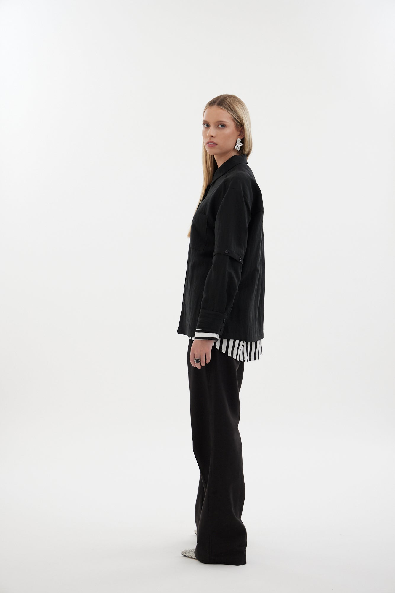 The Rebel Shirt by Racket - a two-in-one shirt with button off sleeves, boxy fit and refined detailing. Available in RKT stripe, white or black. NZ made.