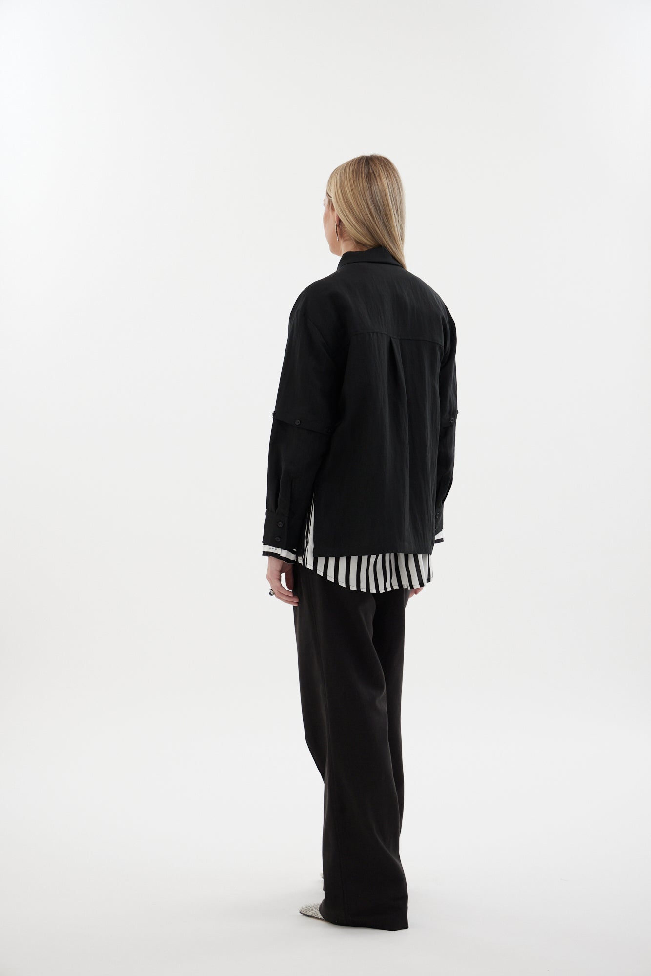The Rebel Shirt by Racket - a two-in-one shirt with button off sleeves, boxy fit and refined detailing. Available in RKT stripe, white or black. NZ made.