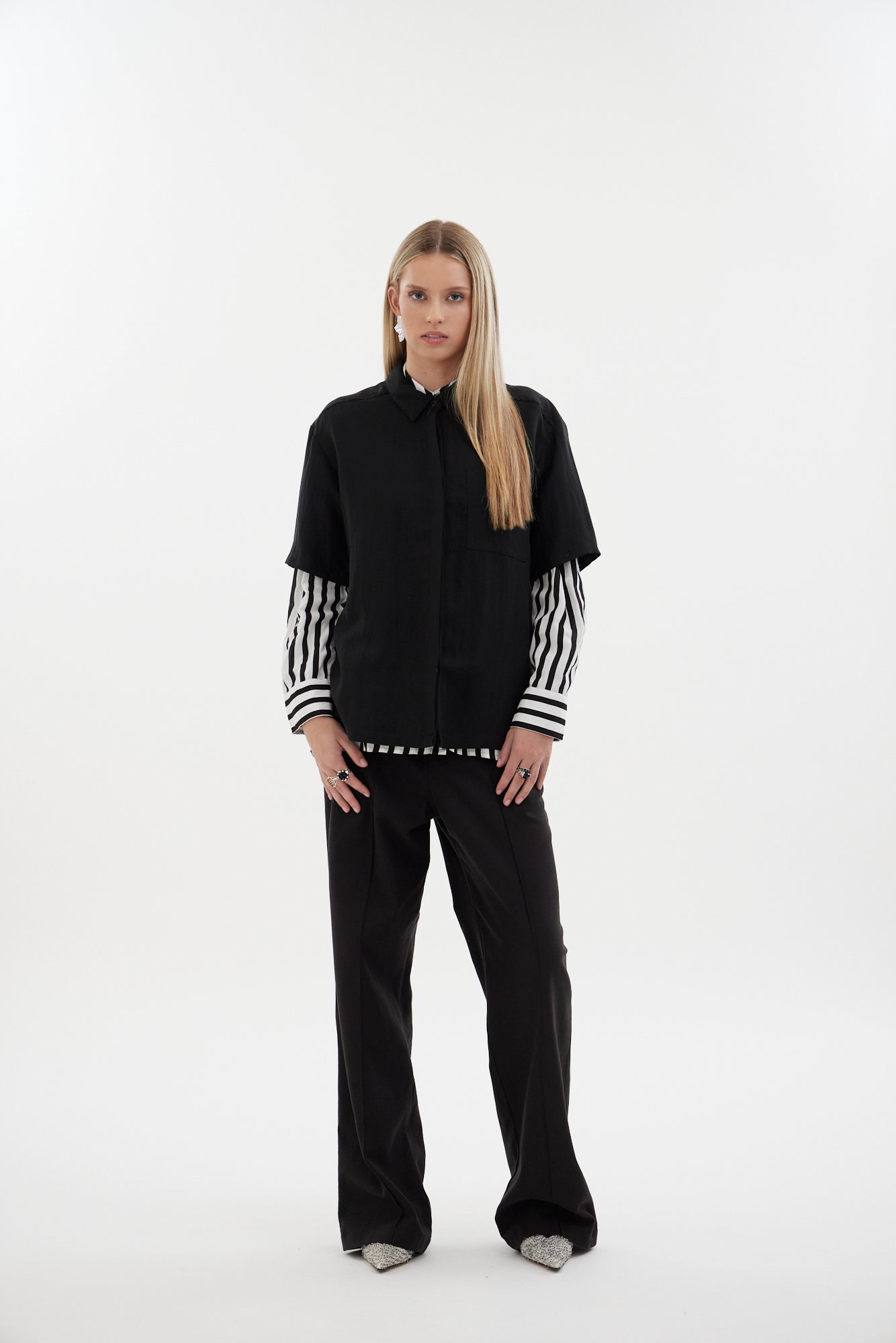 The Rebel Shirt by Racket - a two-in-one shirt with button off sleeves, boxy fit and refined detailing. Available in RKT stripe, white or black. NZ made.