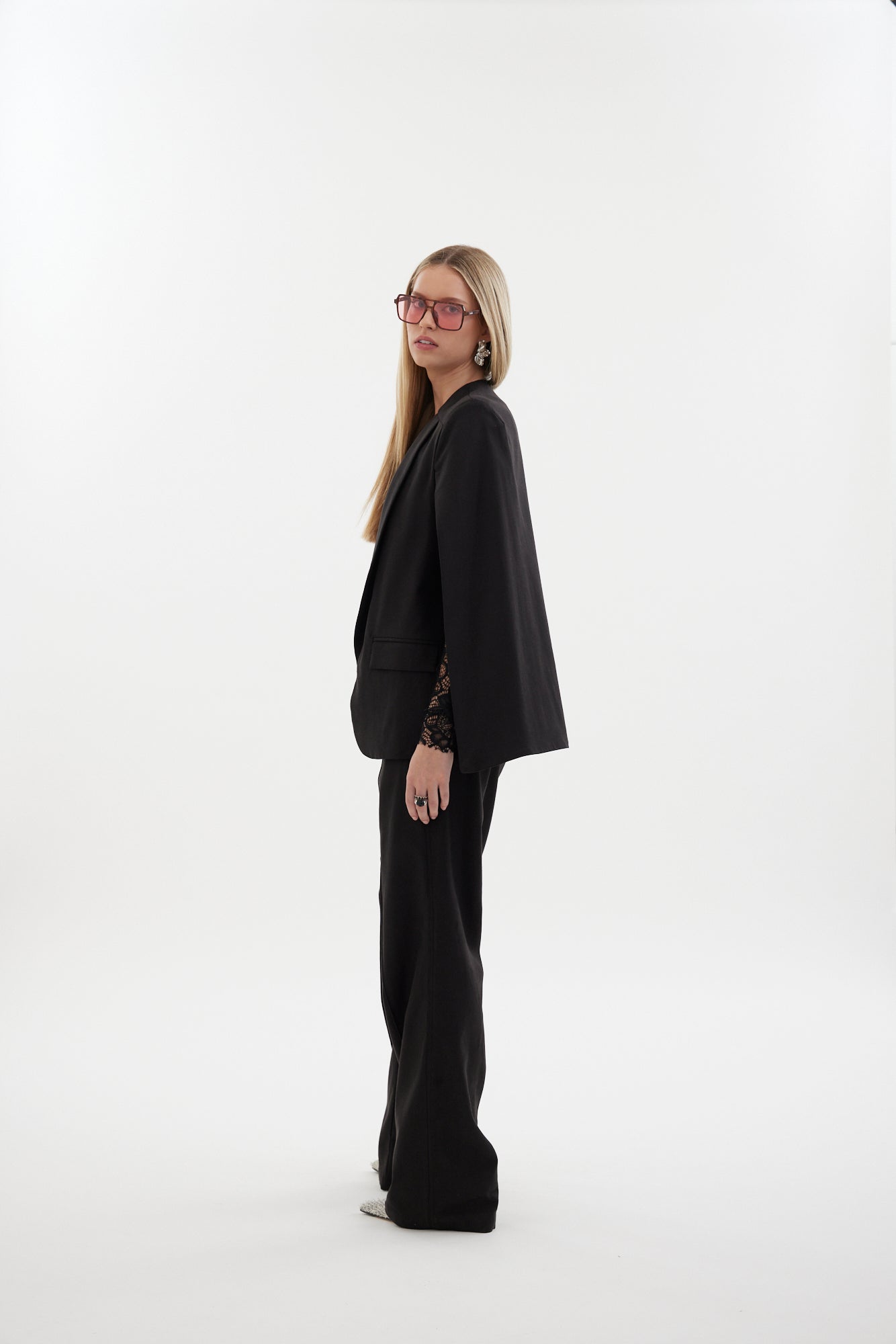 The Siren Cape by Racket - a tailored cape jacket with sleek contrast lapels and subtle shoulder shaping. Style as a suit or with denim. NZ Made.