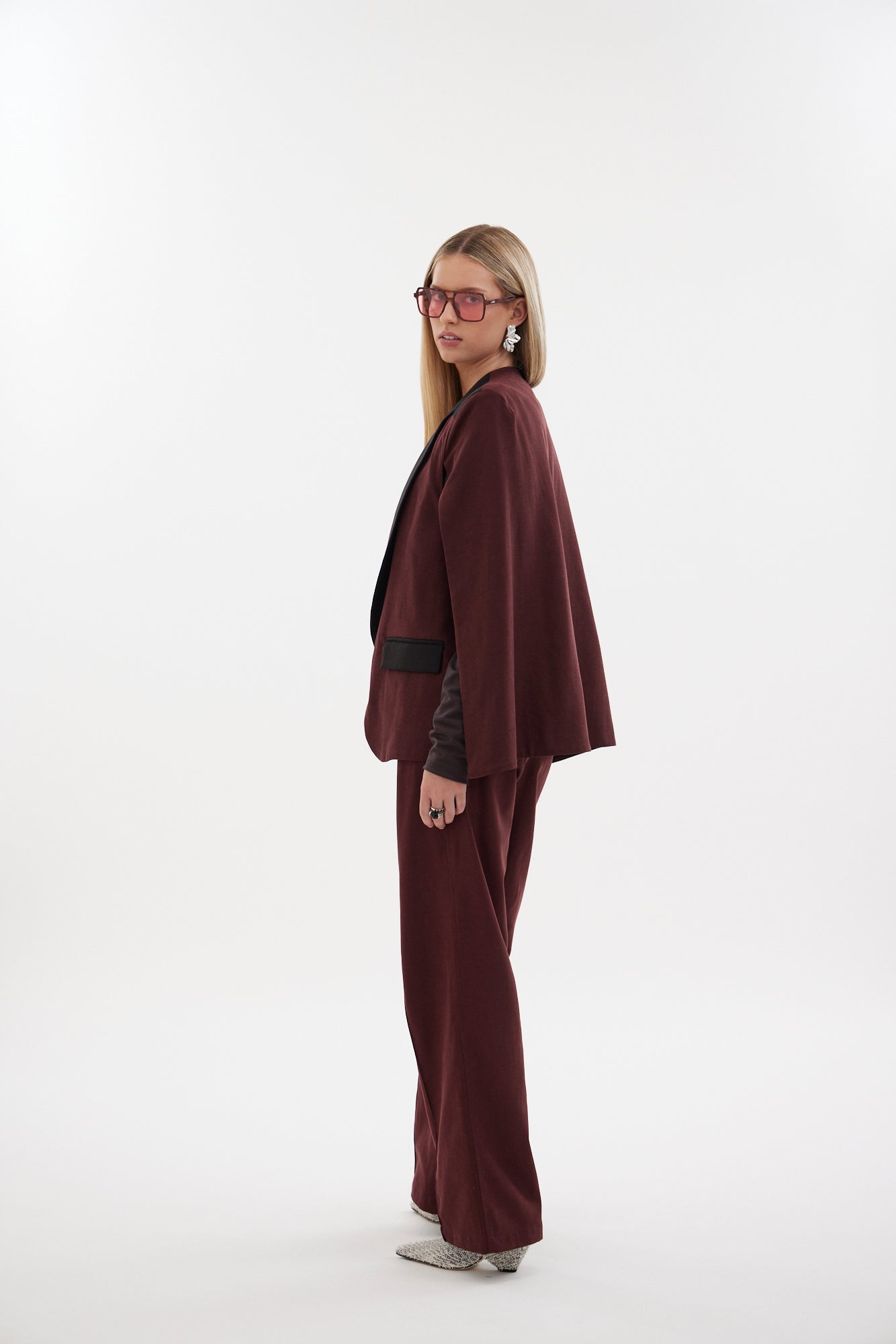 The Siren Cape by Racket - a tailored cape jacket with sleek contrast lapels and subtle shoulder shaping. Style as a suit or with denim. NZ Made.