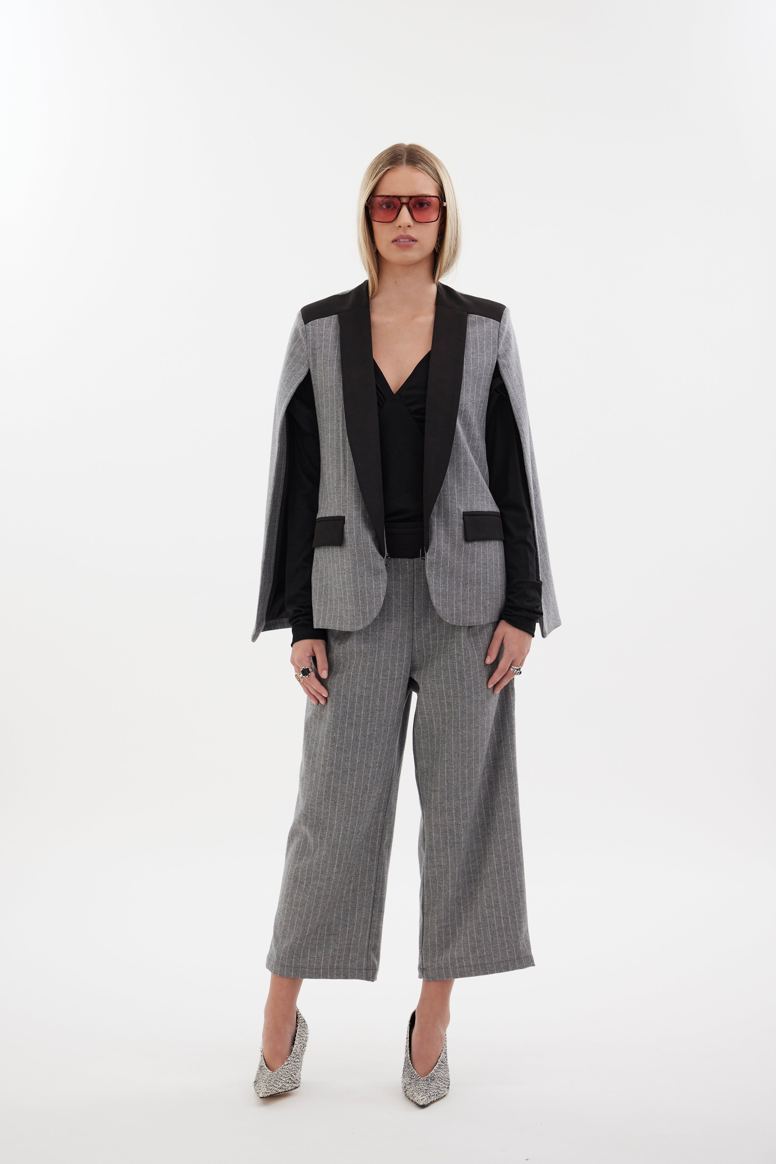 The Siren Cape by Racket - a tailored cape jacket with sleek contrast lapels and subtle shoulder shaping. Style as a suit or with denim. NZ Made.