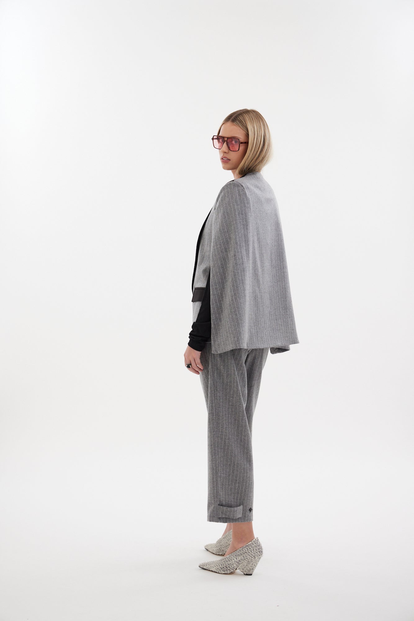 The Siren Cape by Racket - a tailored cape jacket with sleek contrast lapels and subtle shoulder shaping. Style as a suit or with denim. NZ Made.